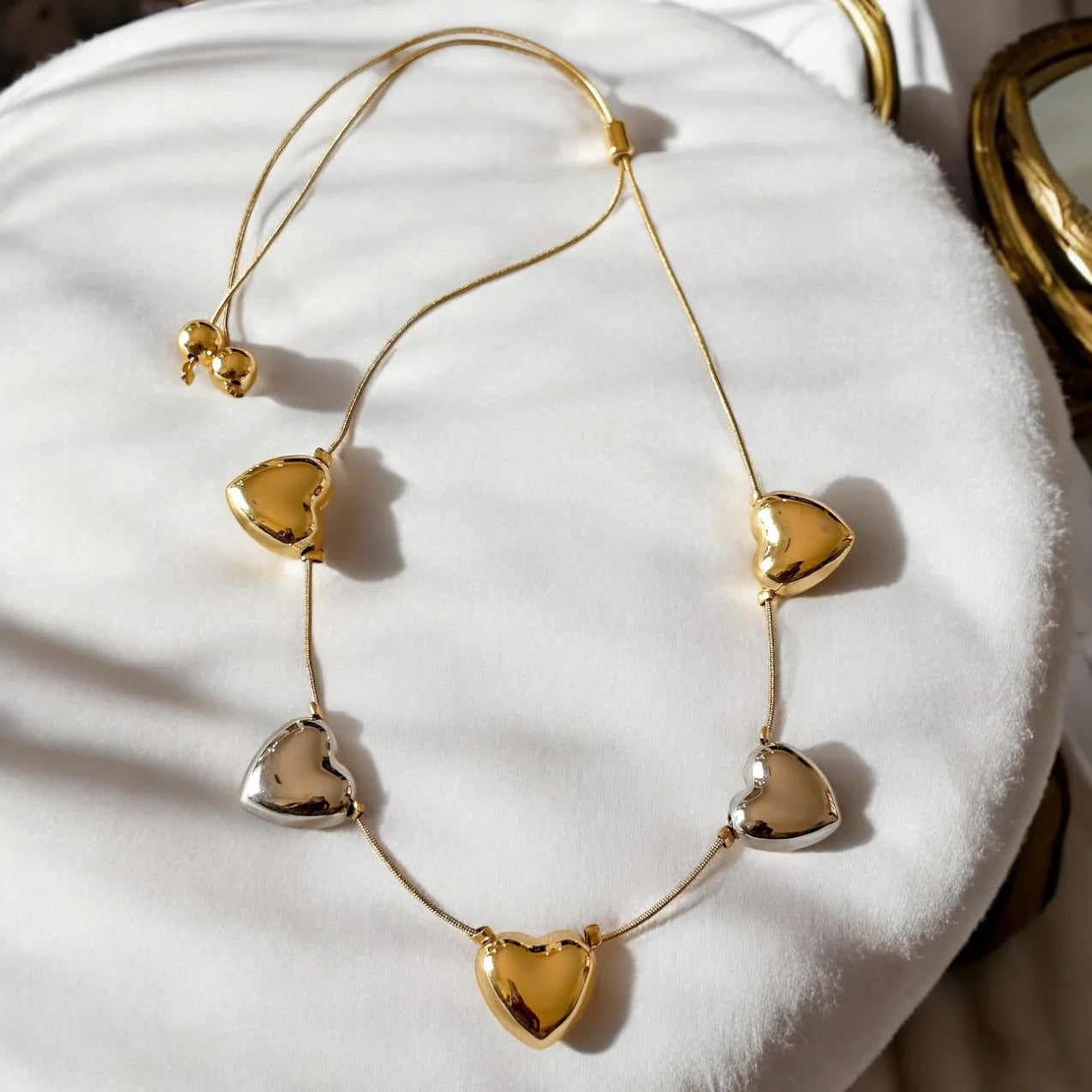 TWO TONE HEARTS NECKLACE